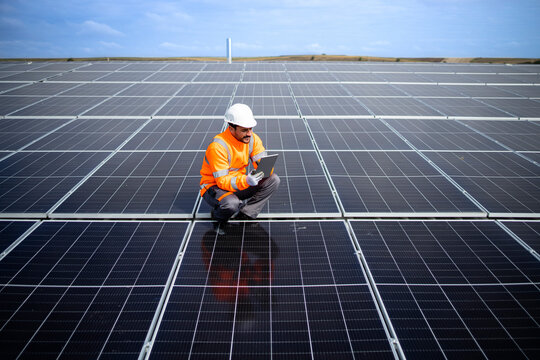 Solar Company Contractor Checking Functionality Of Solar Photovoltaic Panels.