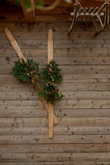 ski and rosemary on wooden background