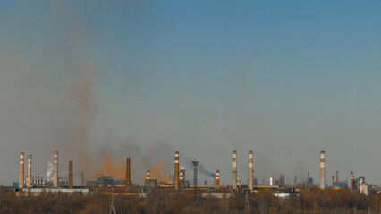 Toxic substances. Gas, steam and smoke. Industrial chimneys. Metallurgical industrial factory. Poisoned air. Epic pollution of nature.