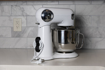 Stand mixer with a cord organizer