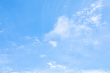 Naklejka na ściany i meble Fantastic soft white clouds against blue sky and copy space horizontal shape