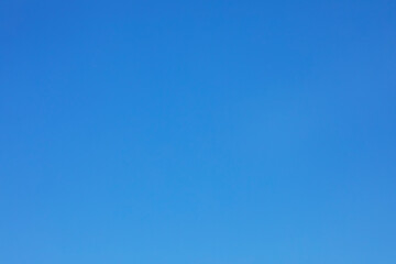 Clear blue sky background and empty space for your design, no cloud