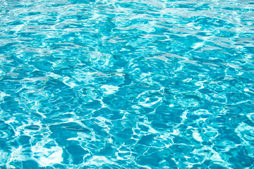 Background of water, surface blue swimming pool.