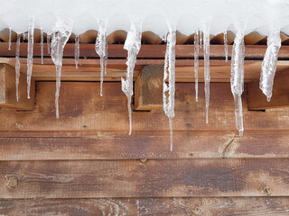 ice icicle on the roof of ski center of anilio greece