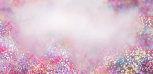 Multicolored gypsophila flowers on a light background. Spring banner, postcard