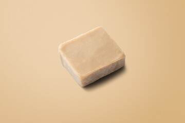 Homemade natural soap on earth tone background