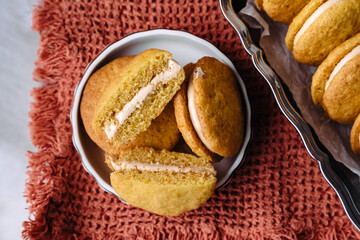 dessert cookies whoopie with cream carrot pumpkin butter cream delicious on orange background