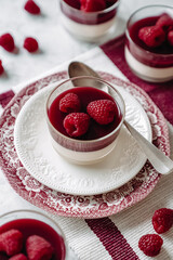 dessert with strawberries fresh mousse pannacotta berry jelly monochrome photo red and white photo...