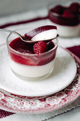 dessert with strawberries fresh mousse pannacotta berry jelly monochrome photo red and white photo...