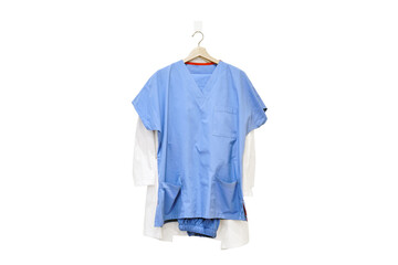 Doctor uniform on a hanger at home, a nurse robe hanging, isolated on a white background