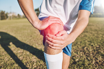 Sports, knee pain and hands on field or football competition, training and exercise injury with...