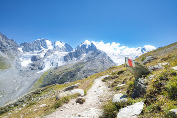 Fototapeta na wymiar Marked trail in the Swiss Alps