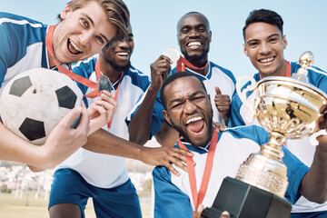 Soccer, trophy and men team winning portrait at sports competition or game with teamwork on a...