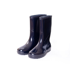 Blue rubber boots with black soles isolated on a white background. Work shoes. Waterproof shoes. Work clothes.