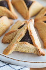 Hamantaschen cookies with chocolate for purim. Traditional Jewish dessert.