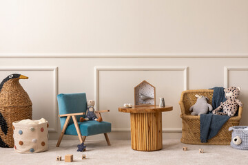 Warm and cozy kids room interior with wooden table, velvet blue, orange armchair, wooden blockers, plush animal toys, wicker basket, beige rug and personal accessories. Home decor. Template.