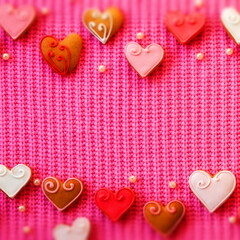 Pink Valentine Wallpaper. Homemade Cookies lie on the knitted Fabric. Top View