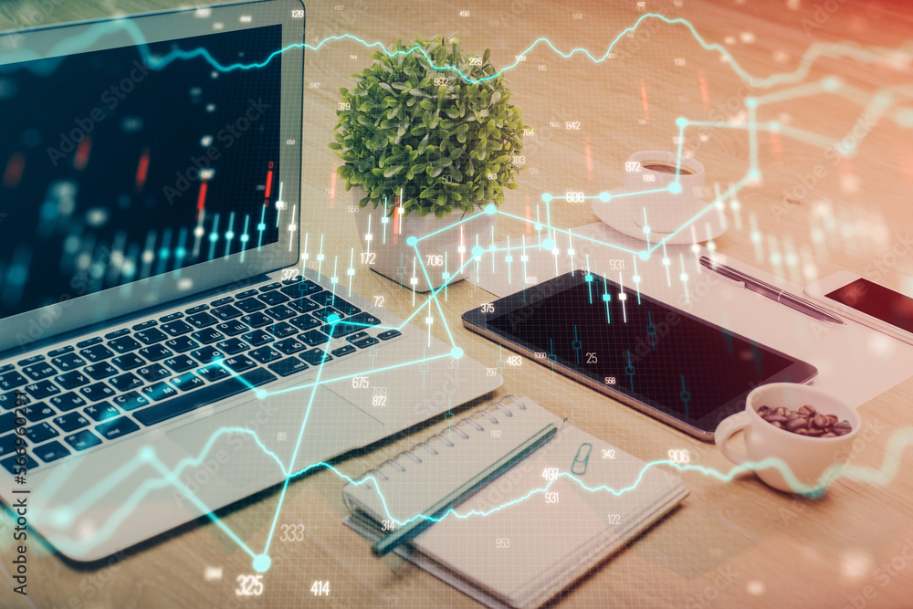 Poster financial market graph hologram and personal computer on background. multi exposure. concept of fore