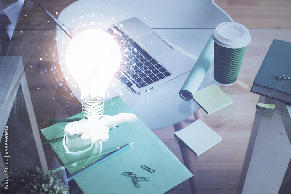 Aufkleber computer on desktop in office with bulb icon hologram. double exposure. concept of idea.
