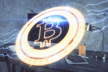 Double exposure of blockchain and crypto economy theme hologram and table with computer background. Concept of bitcoin cryptocurrency.