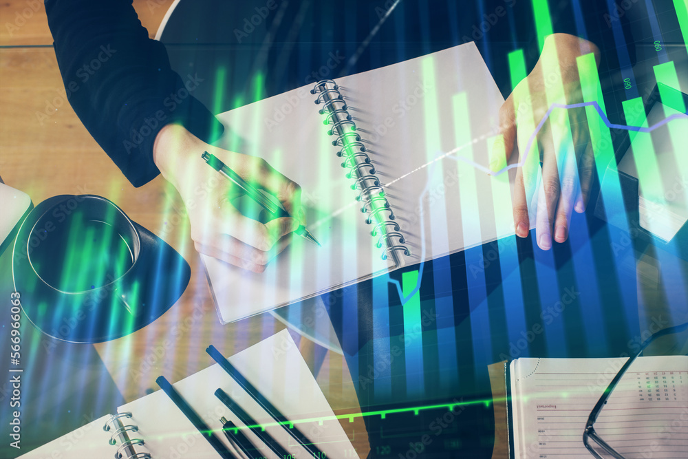 Poster forex graph on hand taking notes background. concept of research. multi exposure