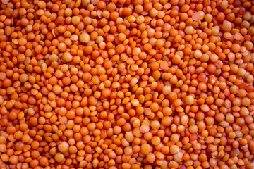 Red lentil texture background photo