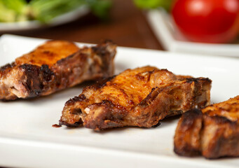 Caucasian shashlik plate with grilled meat .  pork bbq