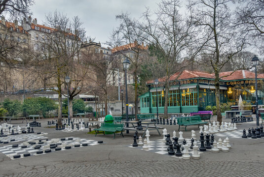 Winter landscape an outdoor chess game with giant chess pieces in the Parc des Bastions. Geneva, Switzerland.