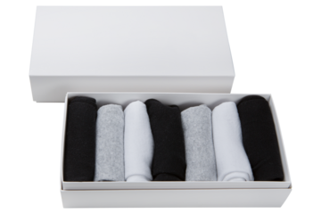 Two sets of socks in white boxes, one box is open, there are seven white, gray and black socks in a set, isolate