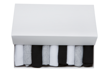 A set of nine gray, white and black socks in a white box, the box is partially open, isolate, flat lay