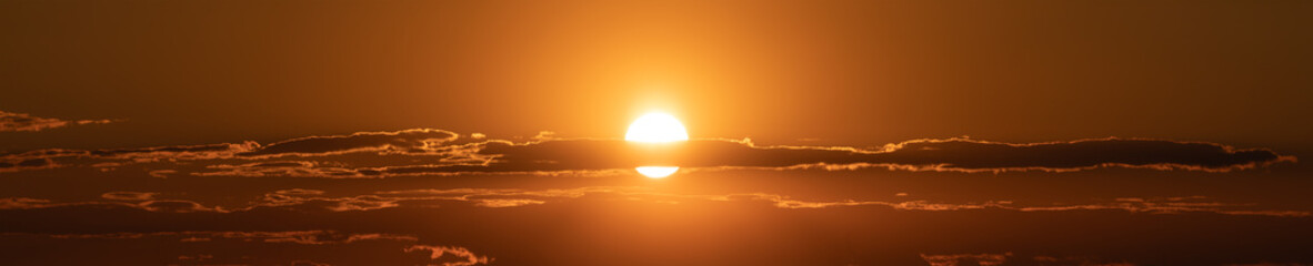 Fototapeta na wymiar Clouds at sunset. Blue and orange. A wonderful natural background.