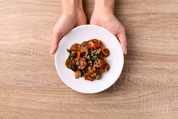 Kimchi cucumber, Korean food side dish, Table top view