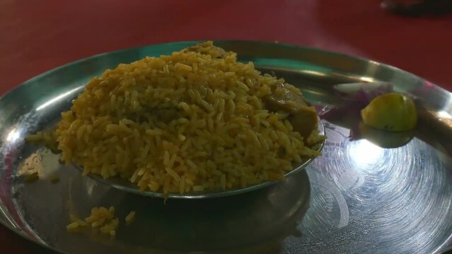 Close view of famous indian food chicken biriyani on a plate