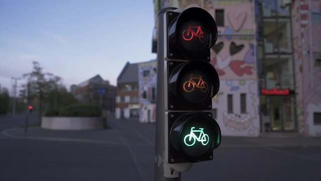 Sustainable urban mobility concept, bicycle traffic light with bicycle sign on a city street