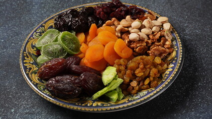 Assorted dry fruits: Dry plum, kiwi, raisins, nuts, pistachios. Tu BiShvat  a Jewish holiday concept
