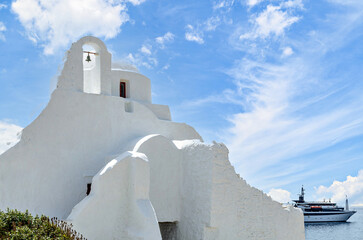 Myconos, views of the white houses with their cobbled streets. Village bathed by the South Aegean Sea, in the Cyclades, Greece