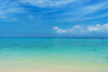 Fototapeta na wymiar Idyllic view of the ocean and sky. Blue sea background. Phuket, Thailand. Traveling concept.