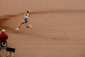 girl jumper running up before in high jump