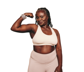 Mature black woman flexing her bicep while standing against a transparent background