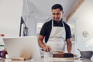 Man, tablet and baking cake recipe in kitchen for birthday party or celebration. Young chef, reading cooking website and bake dessert product on counter for wellness on digital tech device