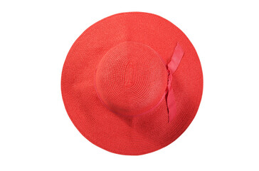 Pretty straw hat with ribbon and bow on white background. Beach hat top view isolated