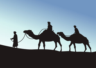 camel caravan going through the desert on beautiful blue sky