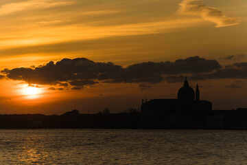 Naklejka na ściany i meble Sunrise and cloudy sky over Venice, Italy