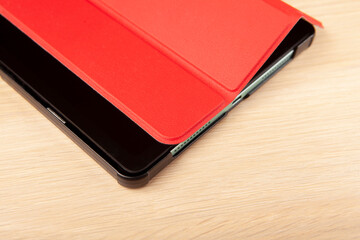 image of tablet case wooden desk background 