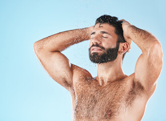 Grooming, hair and hygiene with a man model washing in the shower for hydration or cleaning. Water,...