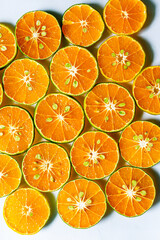macro orange background,Heap of fresh orange slices background. Healthy nutrition with vitamin c....