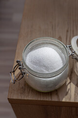 Granulated sugar in glass jar container - Jar full of sugar