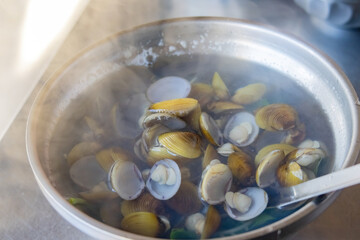 Close up shot of a hot clam soup