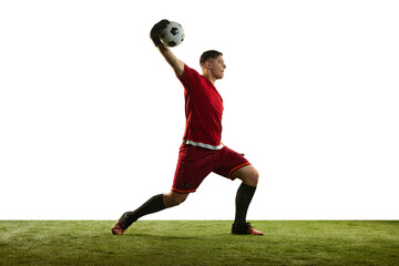 Professional soccer football goalkeeper in action, motion isolated over white studio background. Concept of sport, achievement, competition, goals.