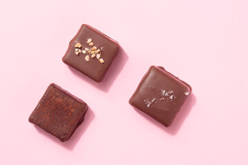 Handcrafted chocolate praline bonbons. Delicious dessert pattern